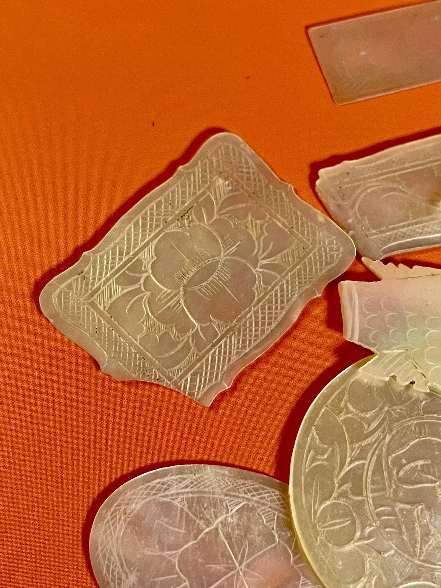 Assorted lot of mother of pearl chips. Approx 1.5 inches