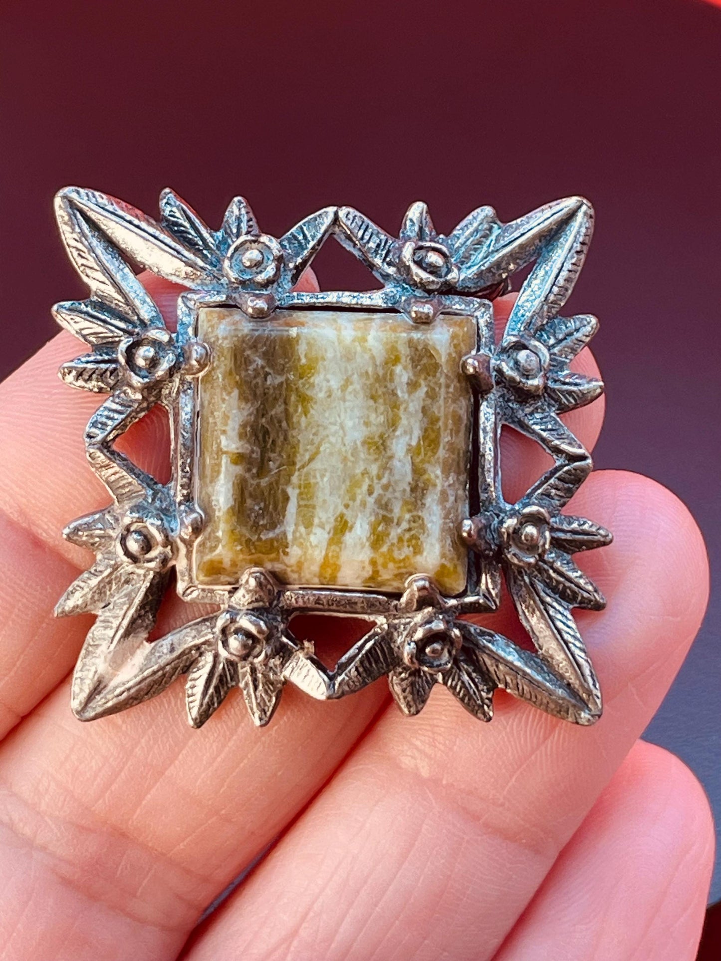 Gorgeous silver brooch with central stone