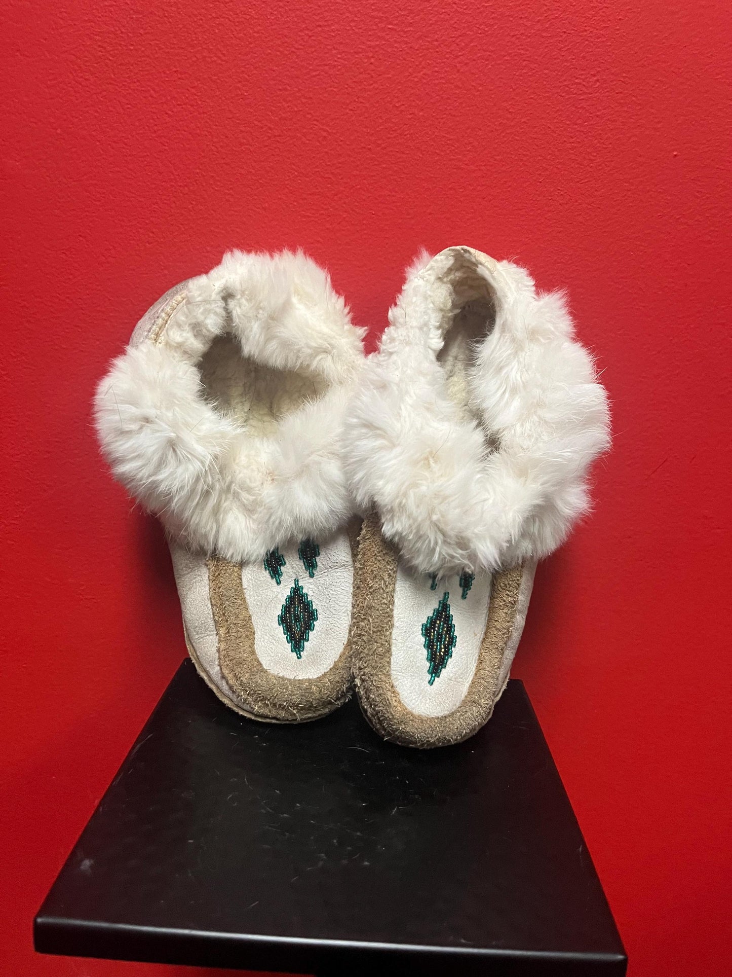 Beautiful indigenous first nations leather fur and beaded moccasin shoes  not perfect so see photos  great for collection  10 inch long