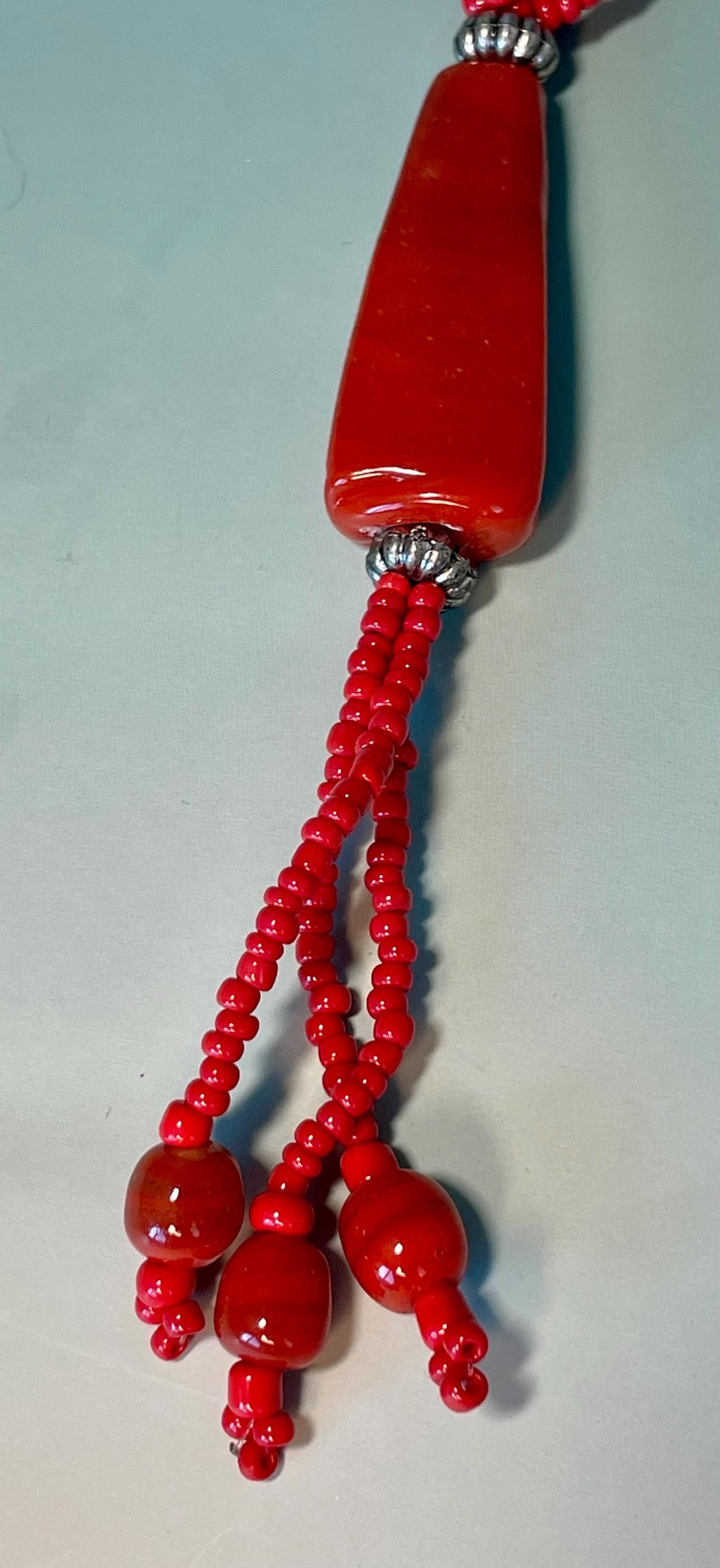 Lot of 2 Necklaces  Red Beaded 24 inch with 4.5 inch Pendant & Silver Leaf 32 inch with 4 inch Pendant