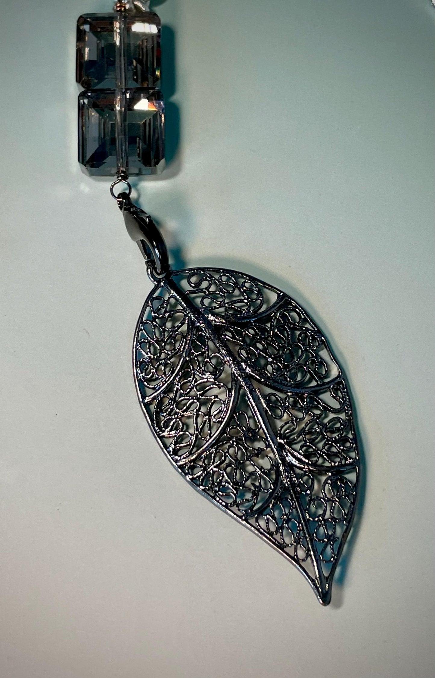 Lot of 2 Necklaces  Red Beaded 24 inch with 4.5 inch Pendant & Silver Leaf 32 inch with 4 inch Pendant