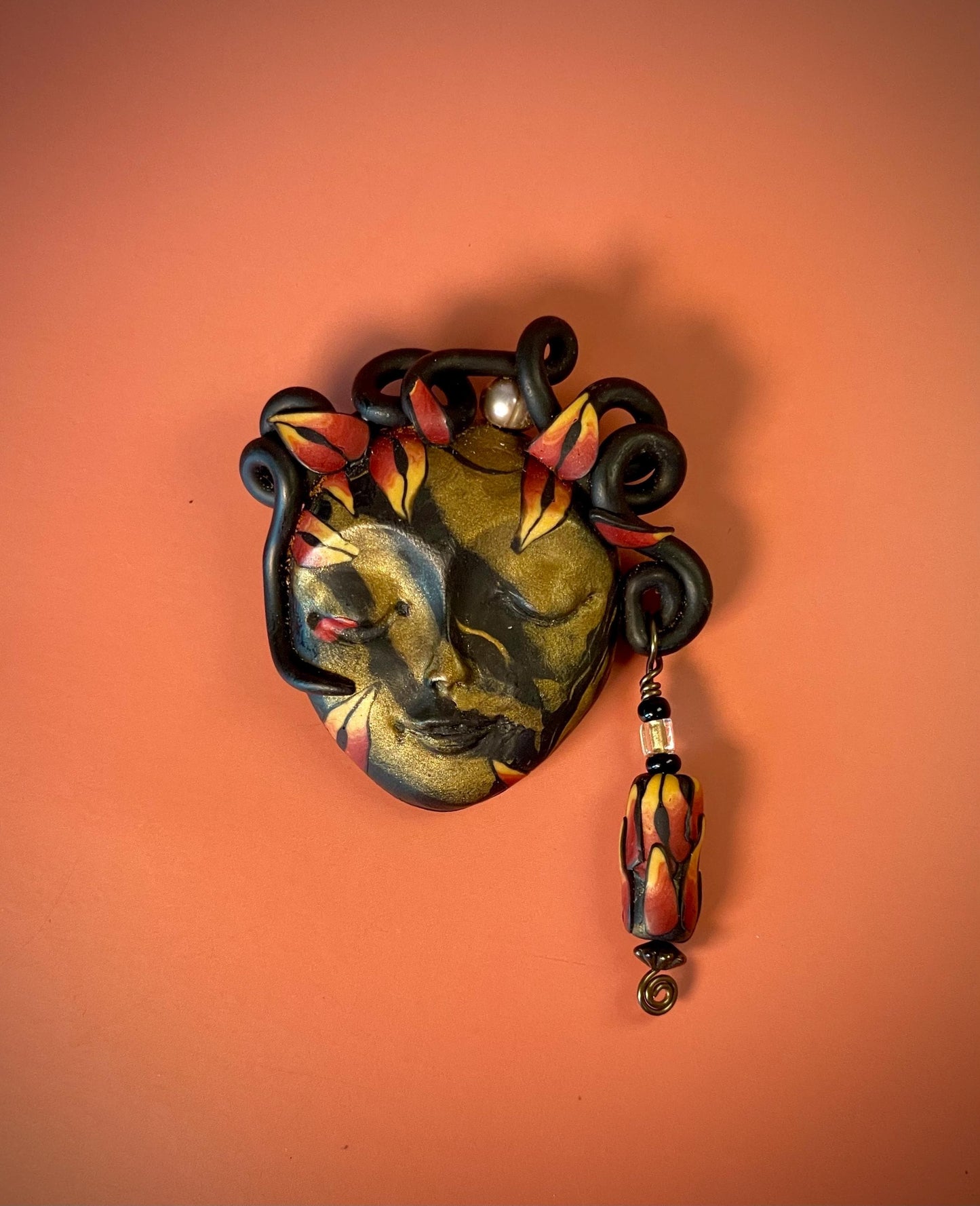 Polymer Clay Brooch  Womans Face with Curled Hair and Dangling Bead