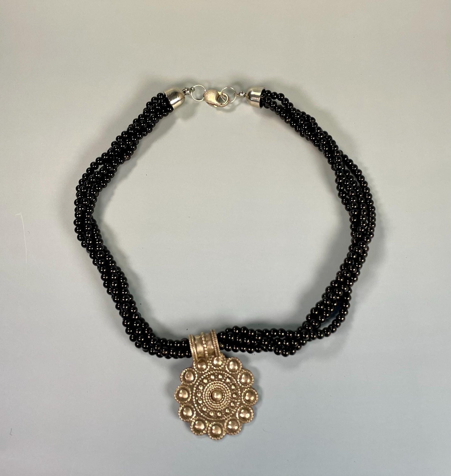Black Beaded Necklace With Metal Pendant