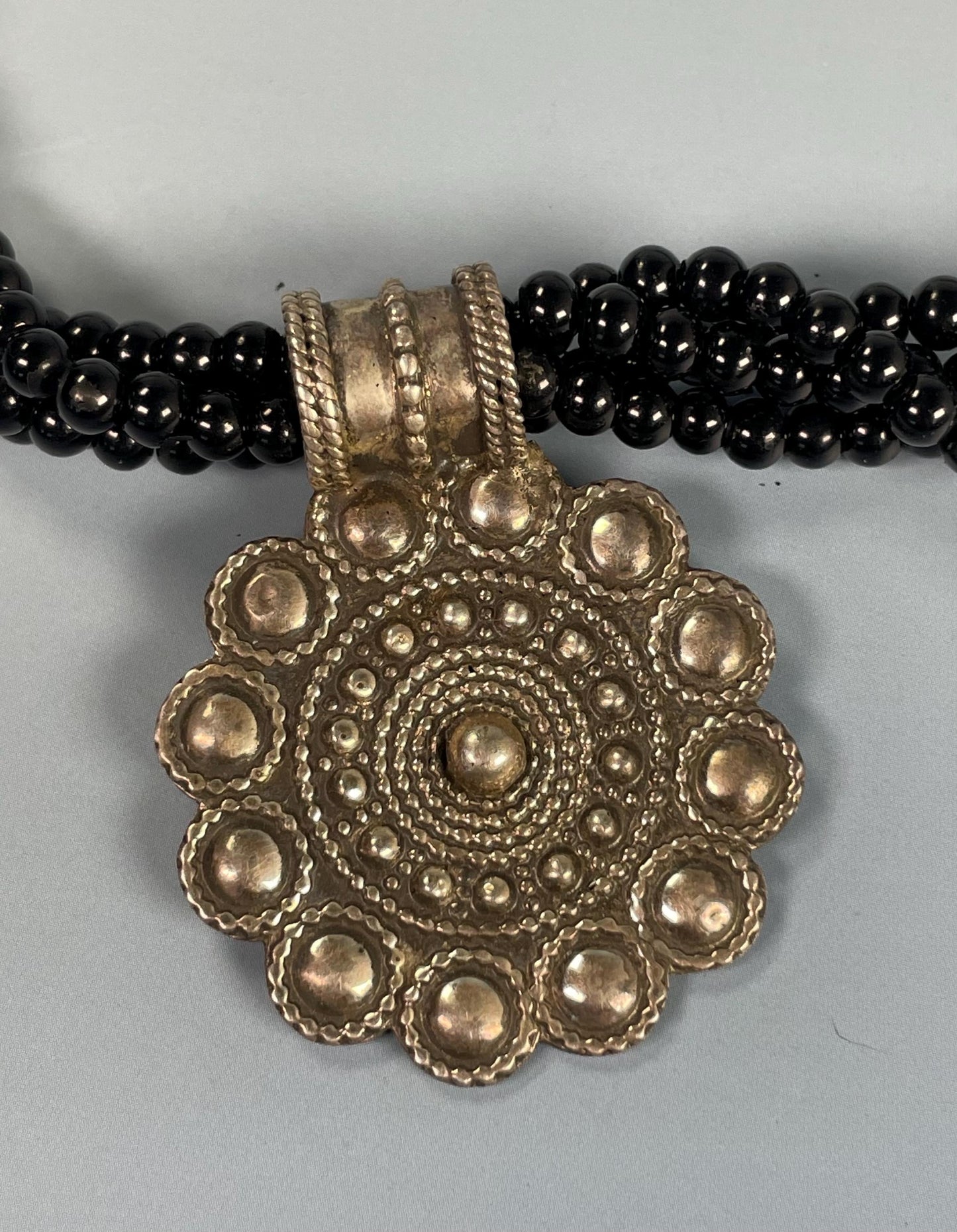 Black Beaded Necklace With Metal Pendant