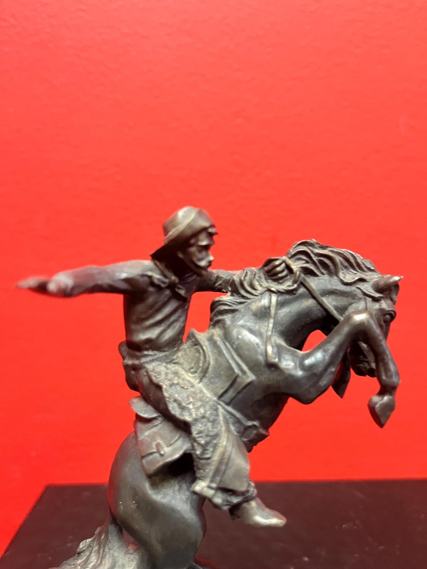 Lovely 5 inch high vintage Remington style bronze statue of a cowboy on horse on wood base great value and great gift