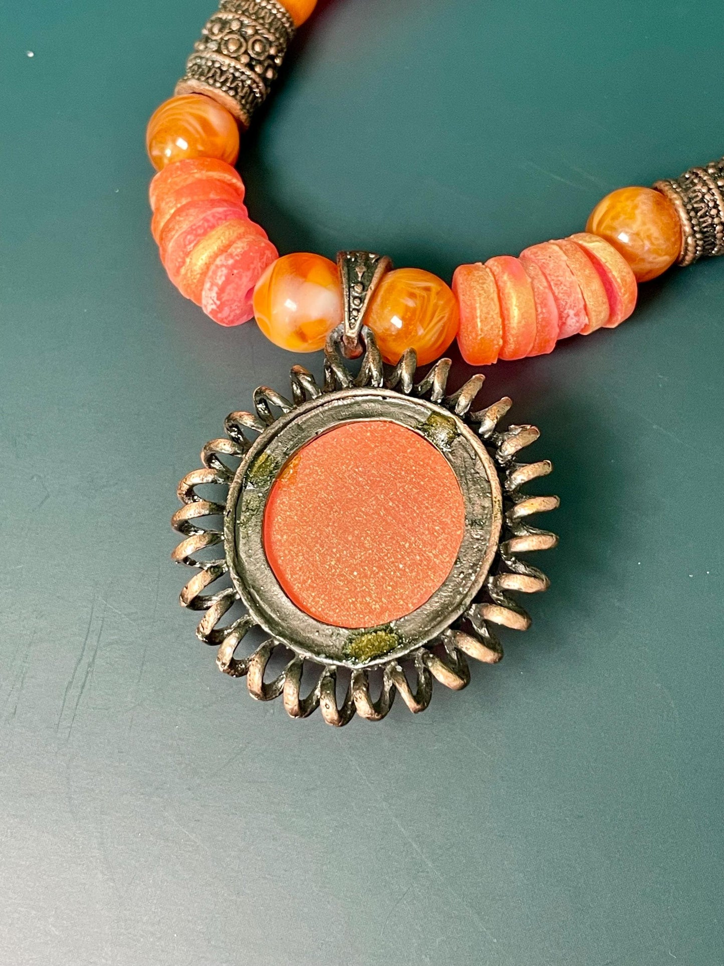 Coral tone Beaded Necklace with Sunburst Pendant  16 Adjustable