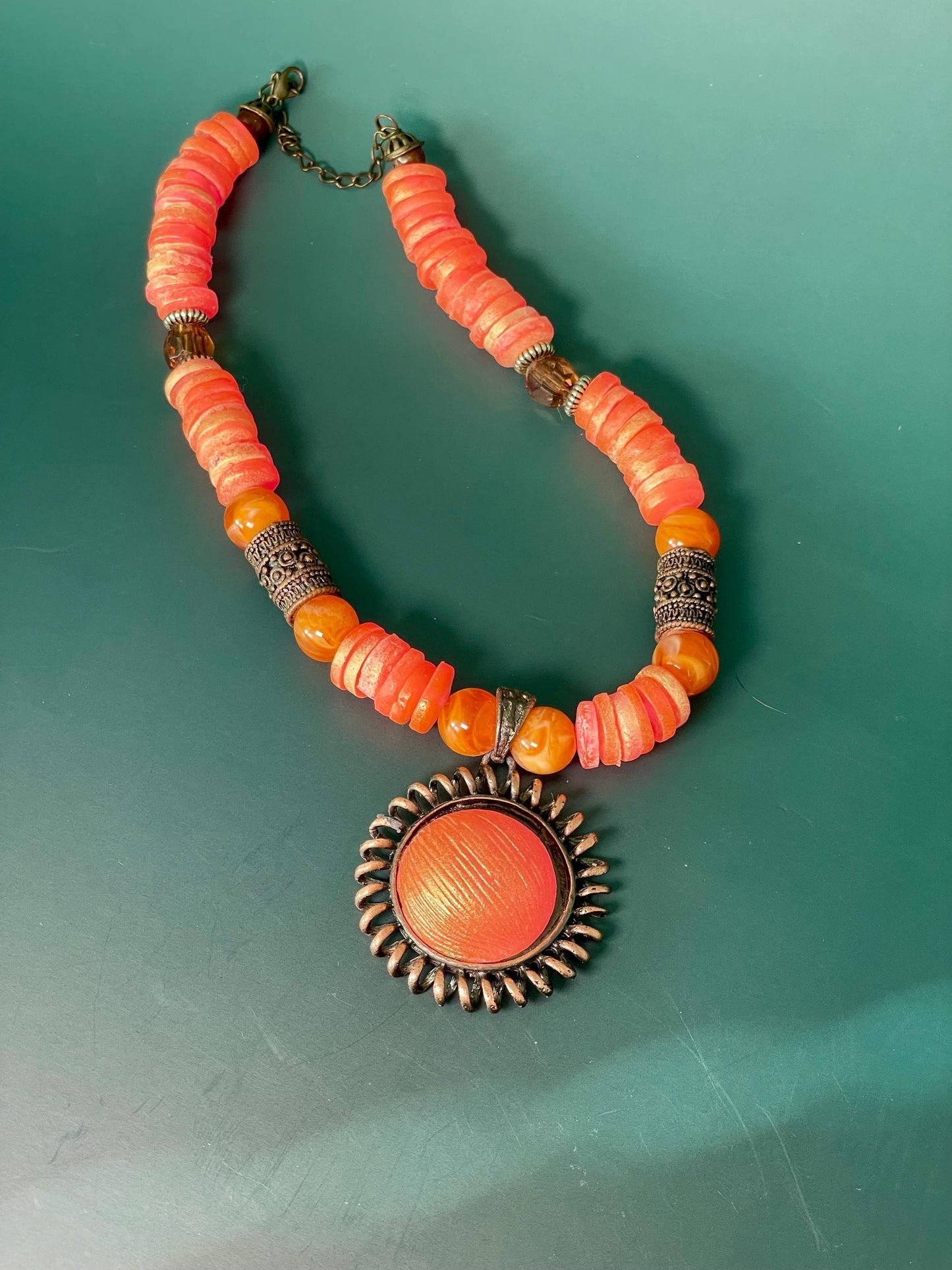 Coral tone Beaded Necklace with Sunburst Pendant  16 Adjustable
