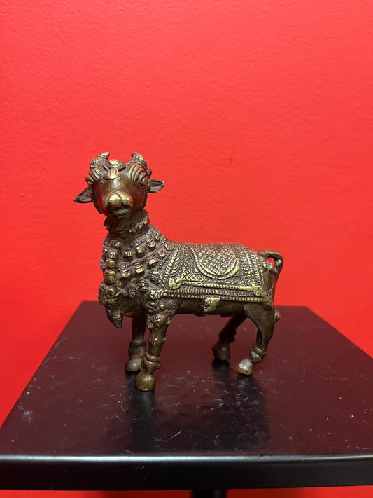 Approximately 18 century Nepalese bronze statue of a bull   Shabdakosh - with amazing patina  and gilding   heavy  4 x 4 inches long- wow
