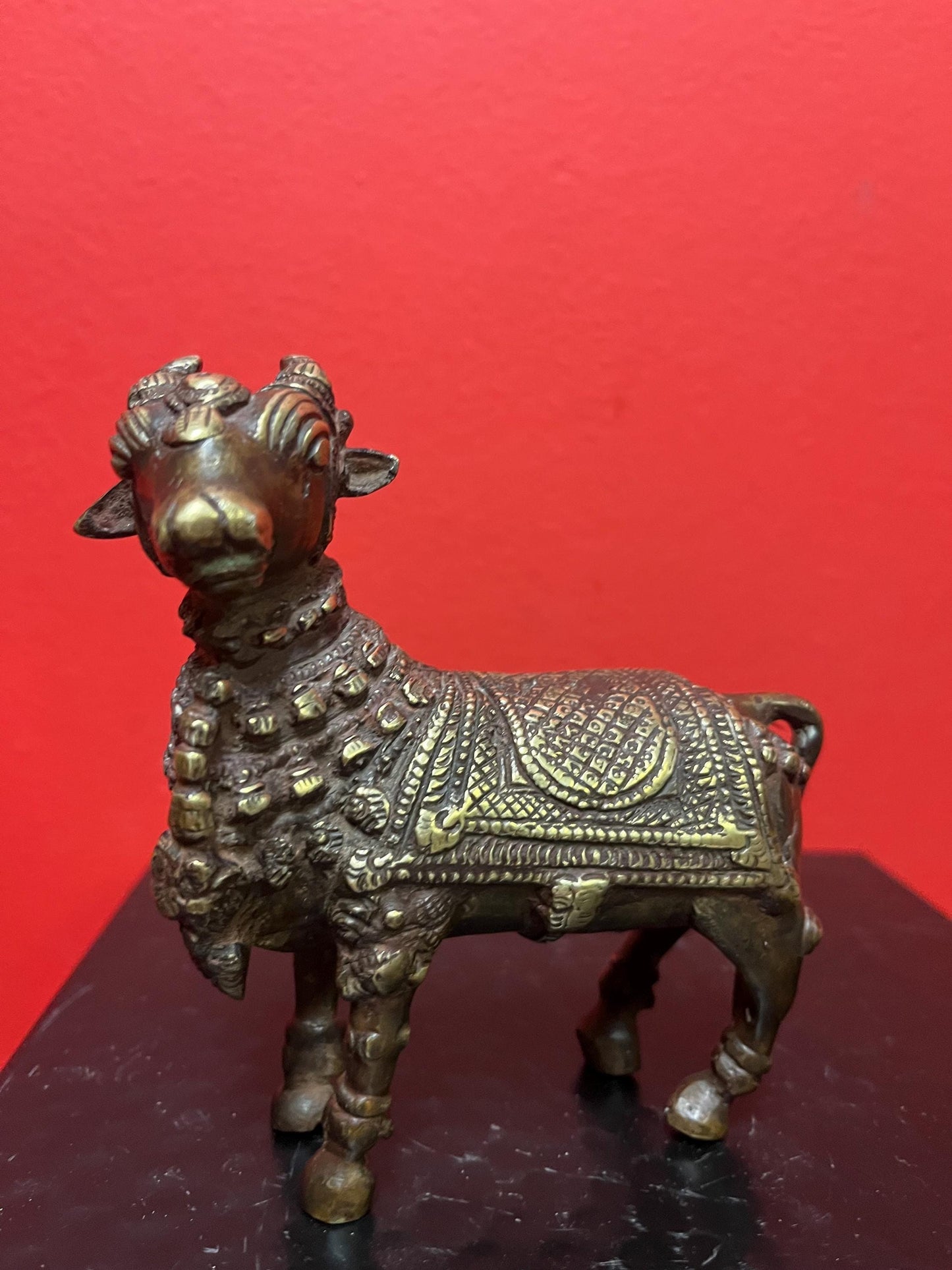 Approximately 18 century Nepalese bronze statue of a bull   Shabdakosh - with amazing patina  and gilding   heavy  4 x 4 inches long- wow