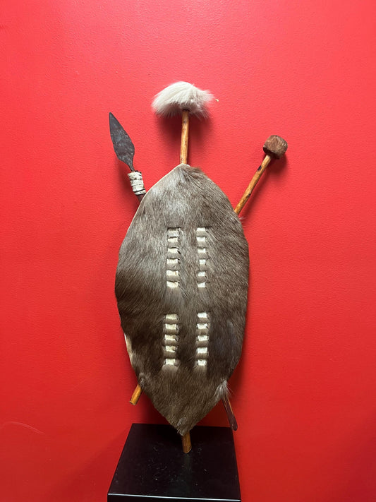 Stunning  antique African childs initiation sheild and  weapons  25 inches long  good condition with tags