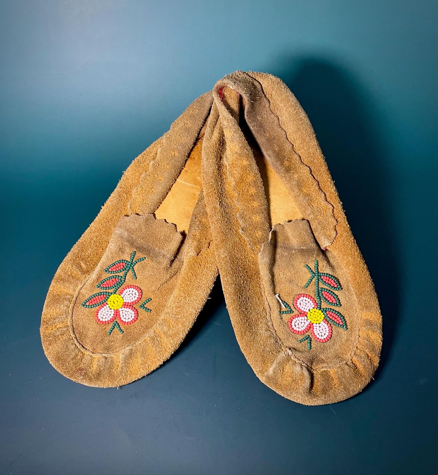 Handcrafted Indigenous Leather Moccasins with Hand-Beaded Detailing