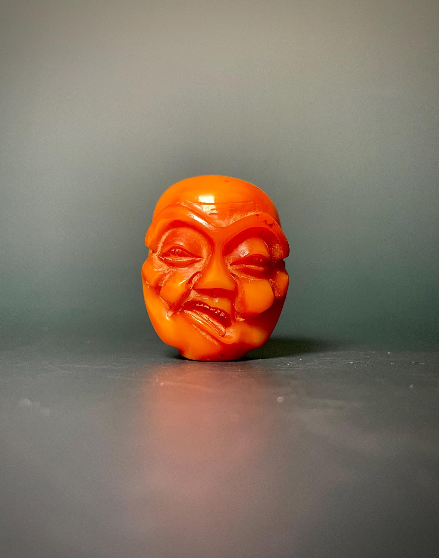 Amber Carved Arhat Head 2 inches high, Intricate Buddhist Art