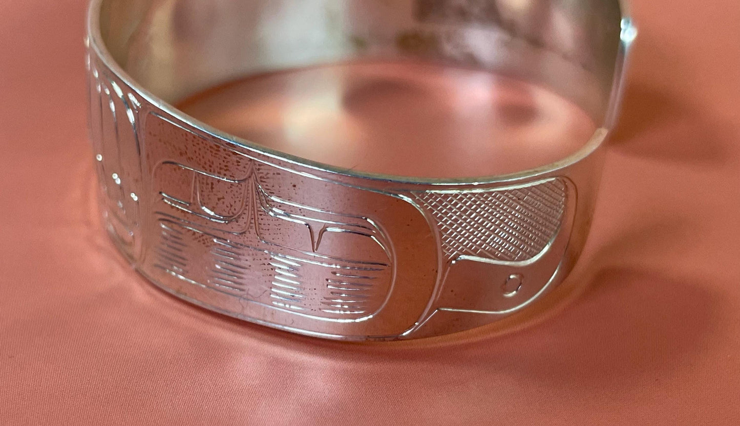 Stunning  2 1/2 inch wide indigenous first nations northwest coast Sterling Tony Hunt wolf bracelet  amazing detail