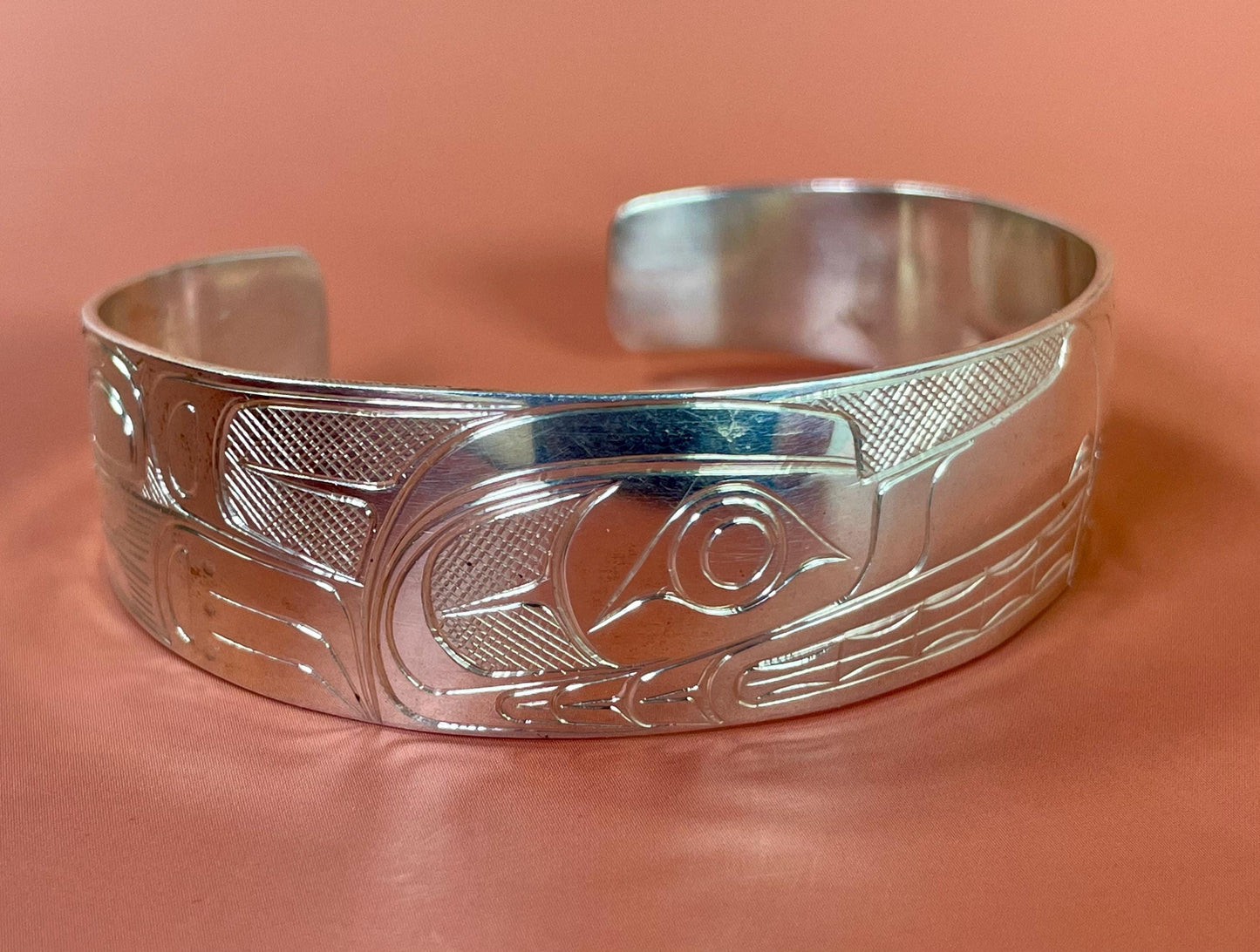 Stunning  2 1/2 inch wide indigenous first nations northwest coast Sterling Tony Hunt wolf bracelet  amazing detail