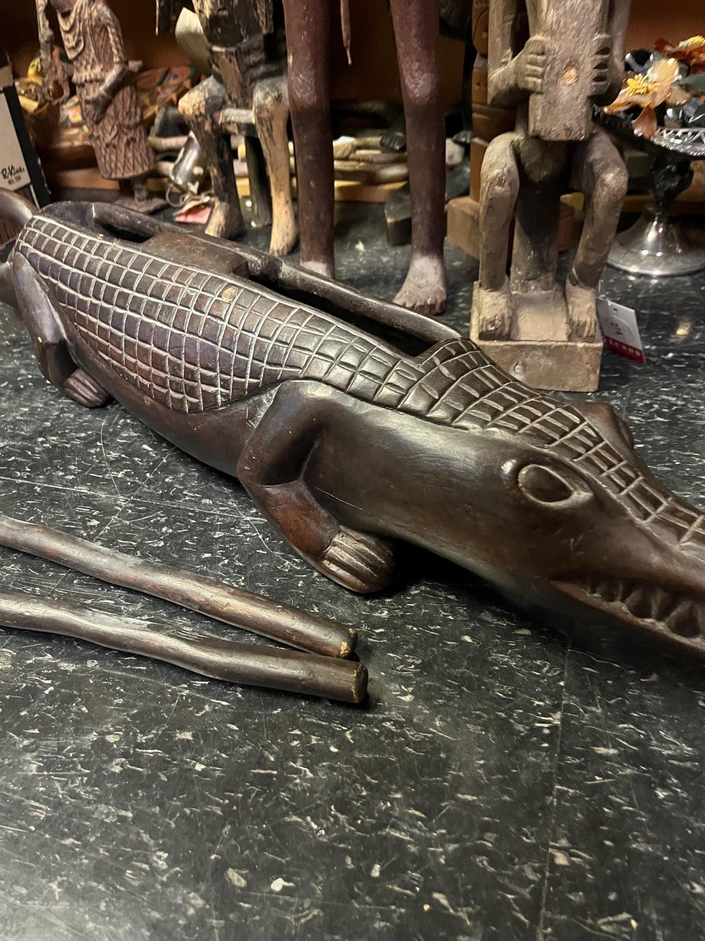 Fabulous 31 inch long antique oceanic musical instrument in the shape of an alligator  great detail and amazing sound  oceanic history
