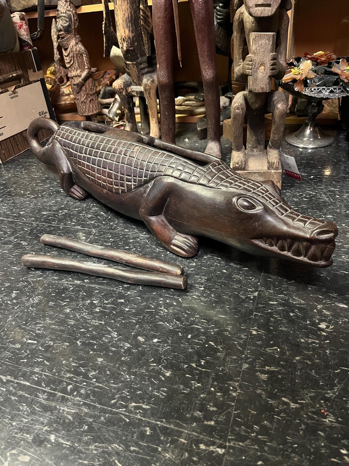 Fabulous 31 inch long antique oceanic musical instrument in the shape of an alligator  great detail and amazing sound  oceanic history