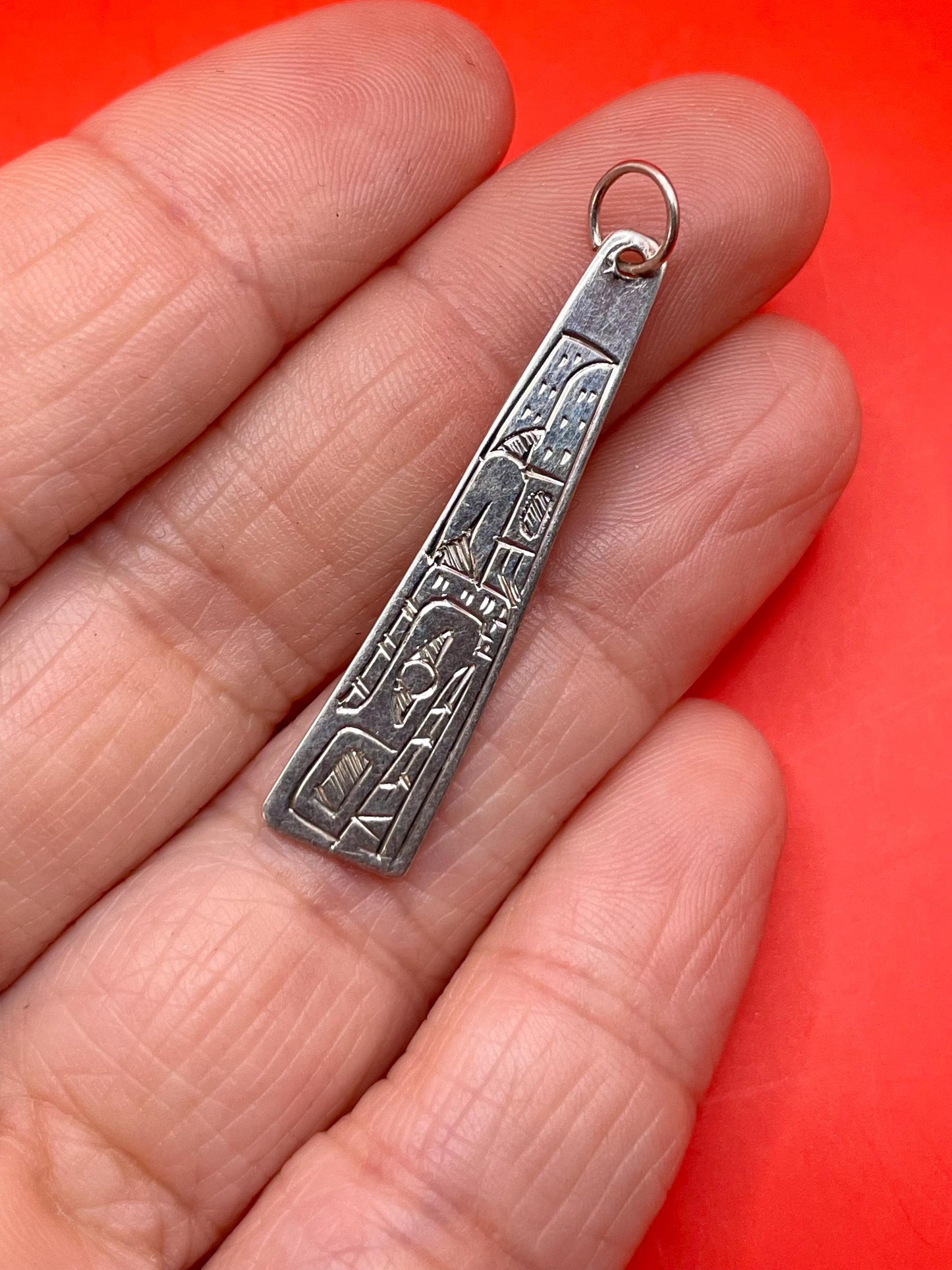 Beautiful indigenous first nations Pacific northwest coast sterling silver wolf pendant