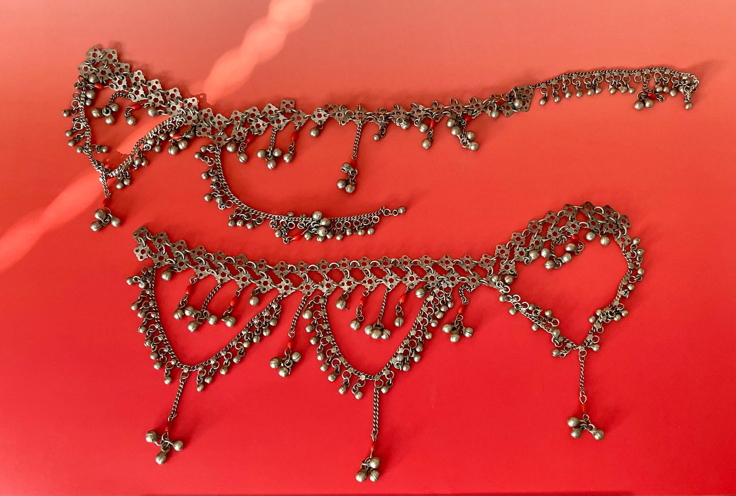 Pieces of Metal Belt (?) with Dangling Charms