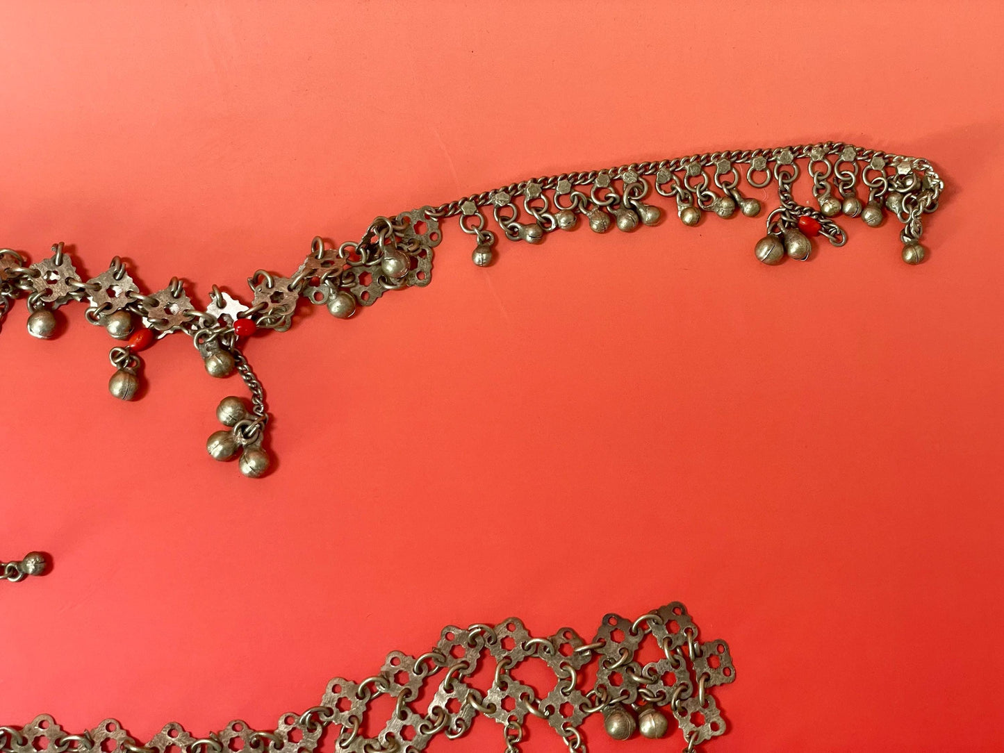 Pieces of Metal Belt (?) with Dangling Charms