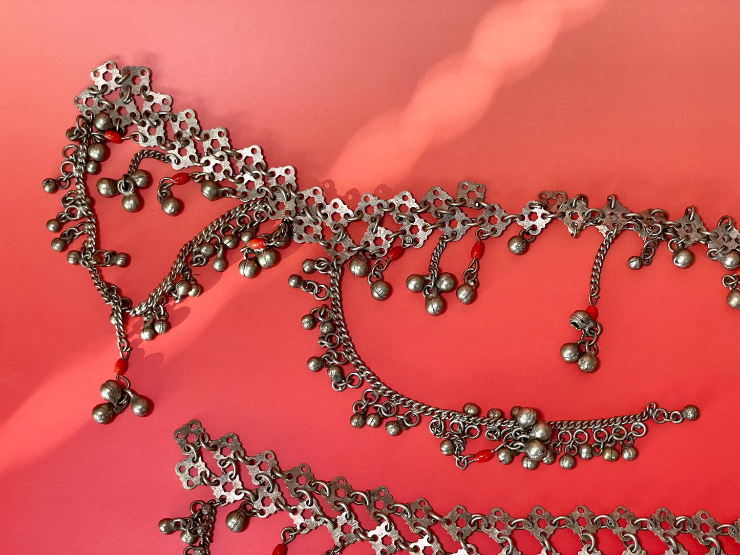 Pieces of Metal Belt (?) with Dangling Charms