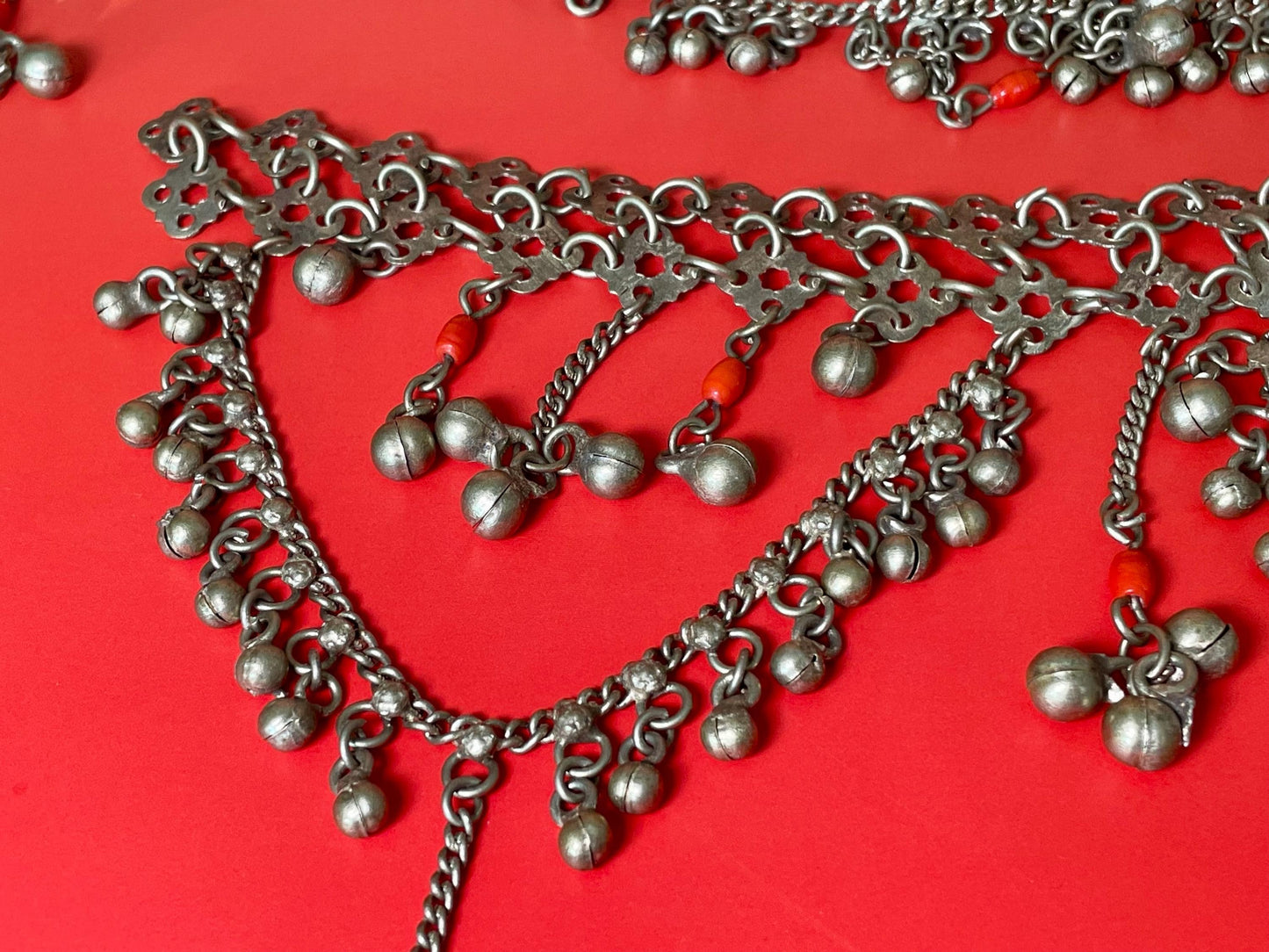 Pieces of Metal Belt (?) with Dangling Charms