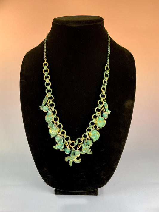 Lovely ocean themed bronze necklace - approximately 25 inches long  very unusual and cool