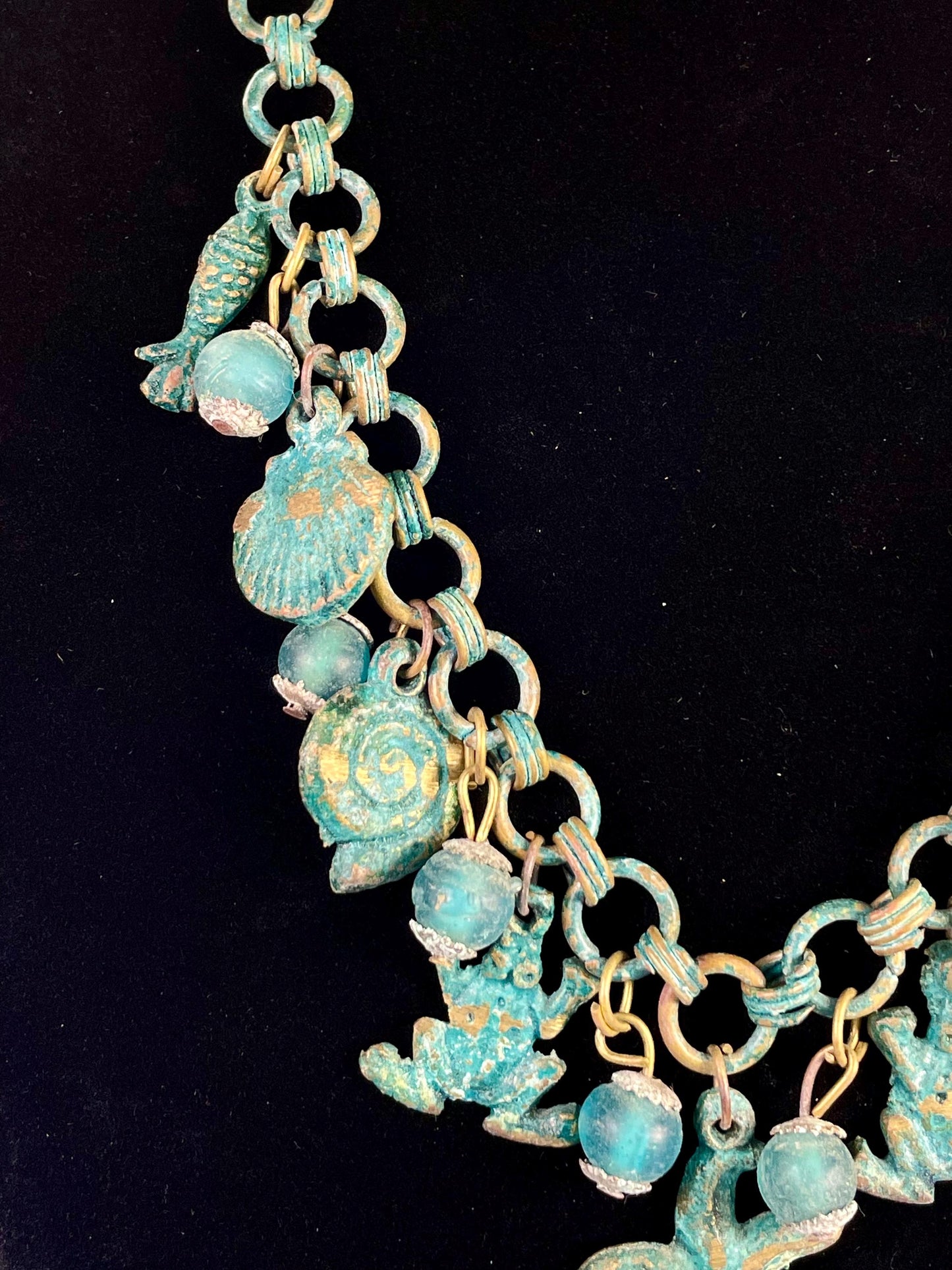 Lovely ocean themed bronze necklace - approximately 25 inches long  very unusual and cool
