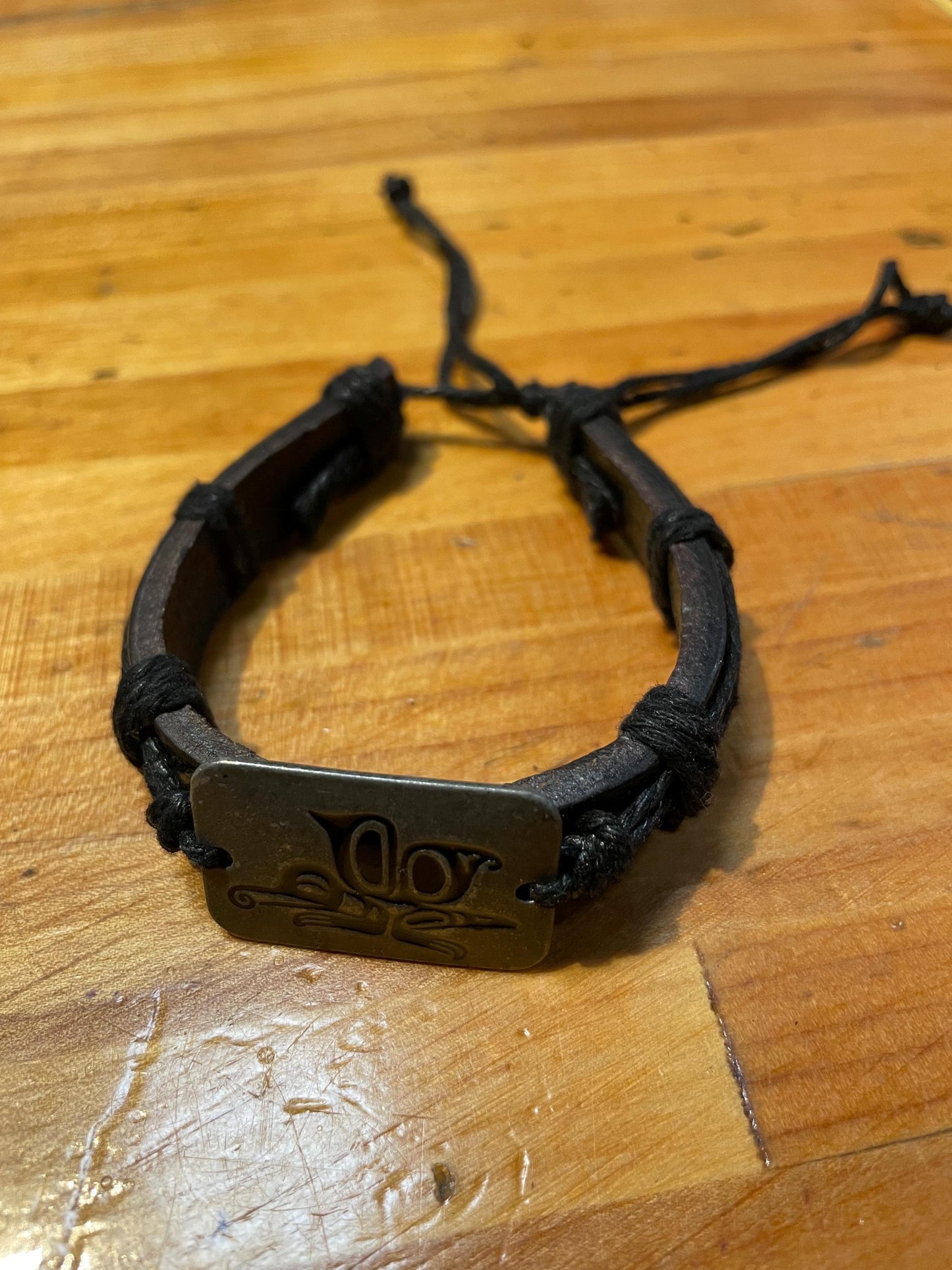 Handcrafted Leather Bracelet with Tribal Butterfly Design