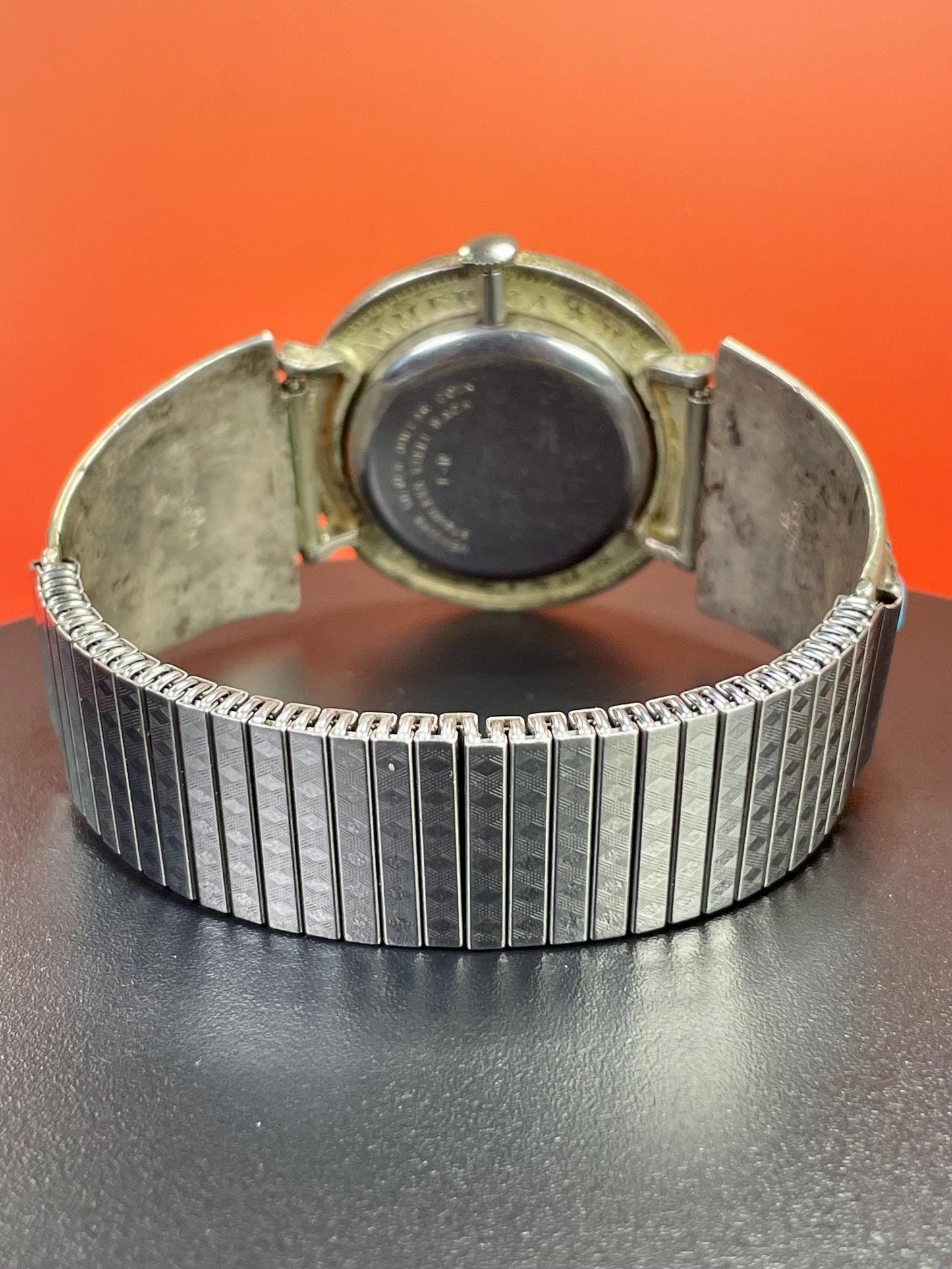 Lovely Navajo watch with coin face and expandible band  sold as is  good project and great value