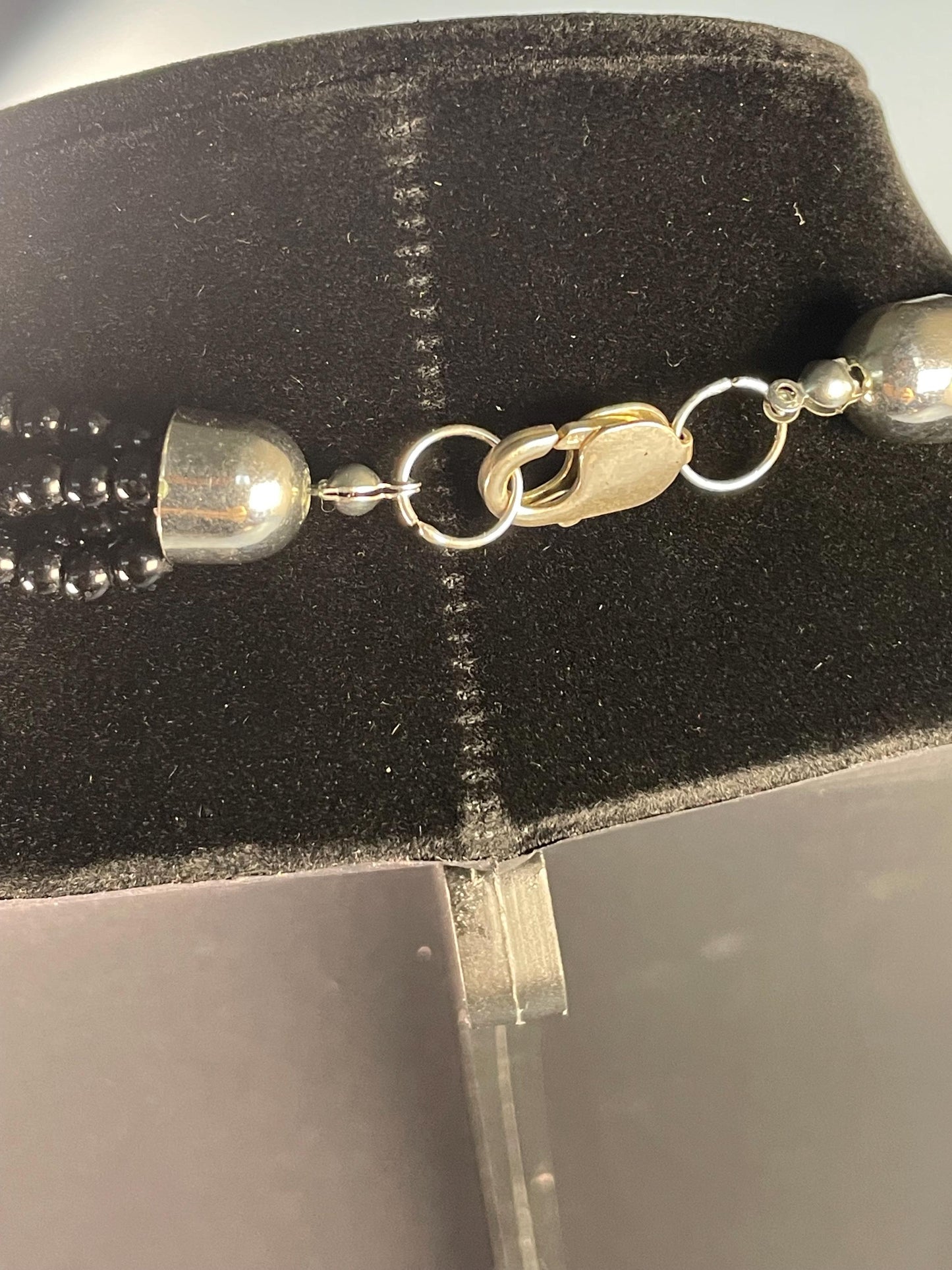 Black Beaded Necklace With Metal Pendant