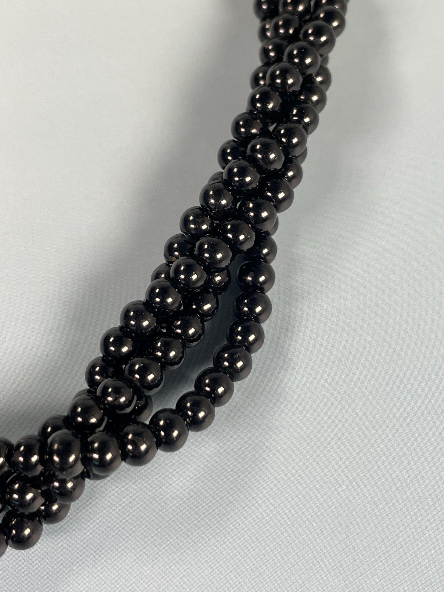 Black Beaded Necklace With Metal Pendant