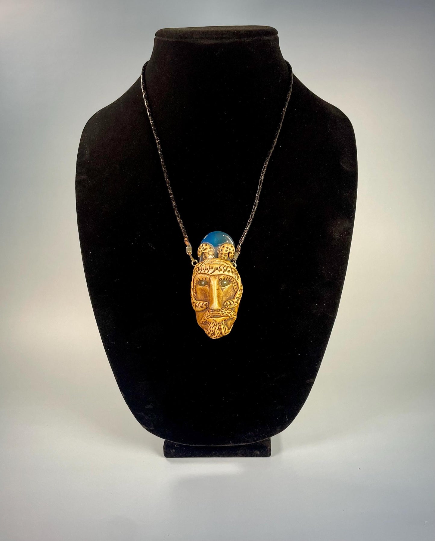 Ancient-Inspired Resin Face Pendant Necklace