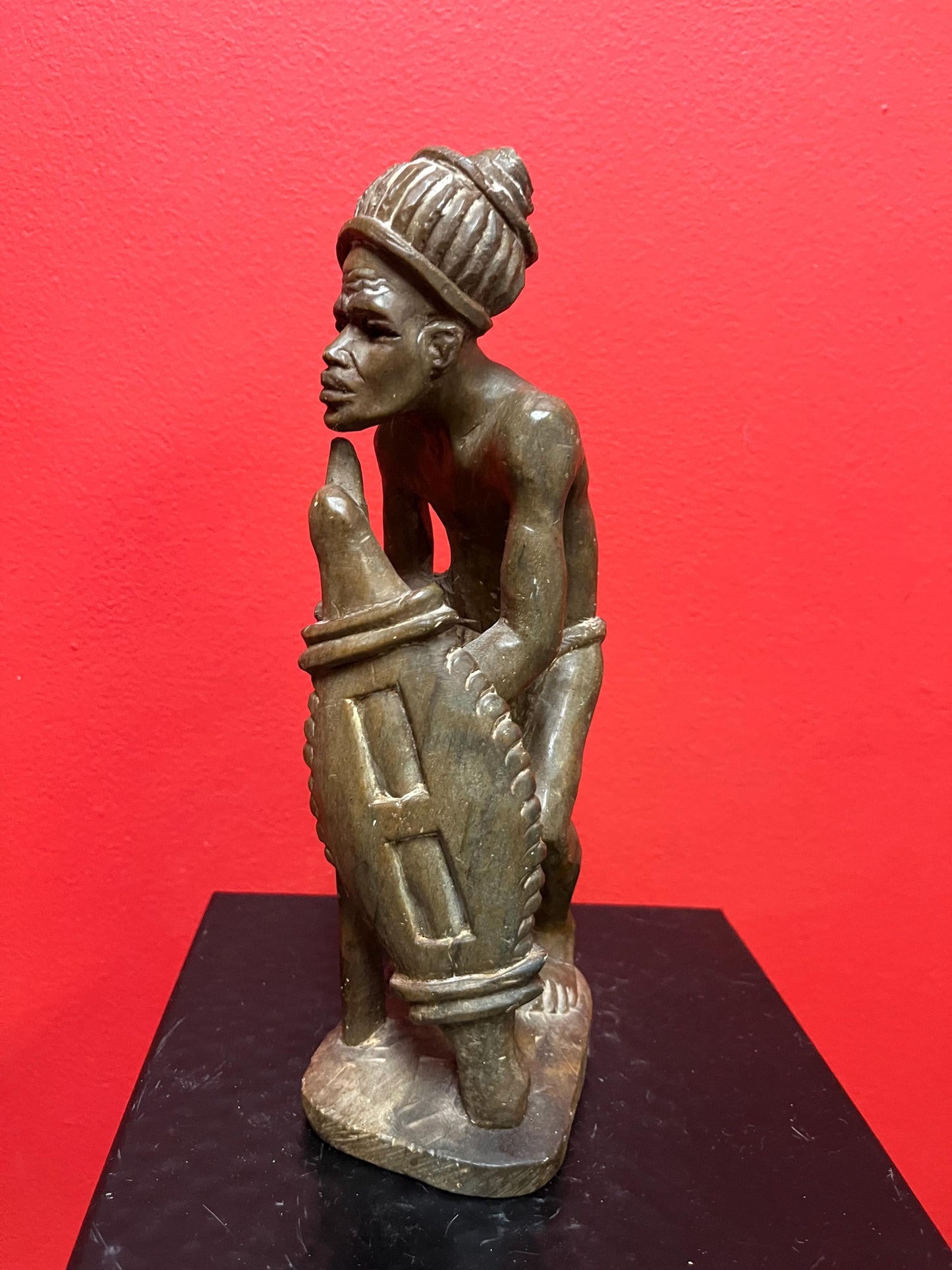 Lovely older 9 inch African stone statue  well carved and heavy