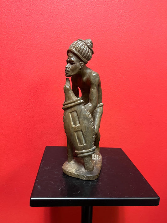 Lovely older 9 inch African stone statue  well carved and heavy