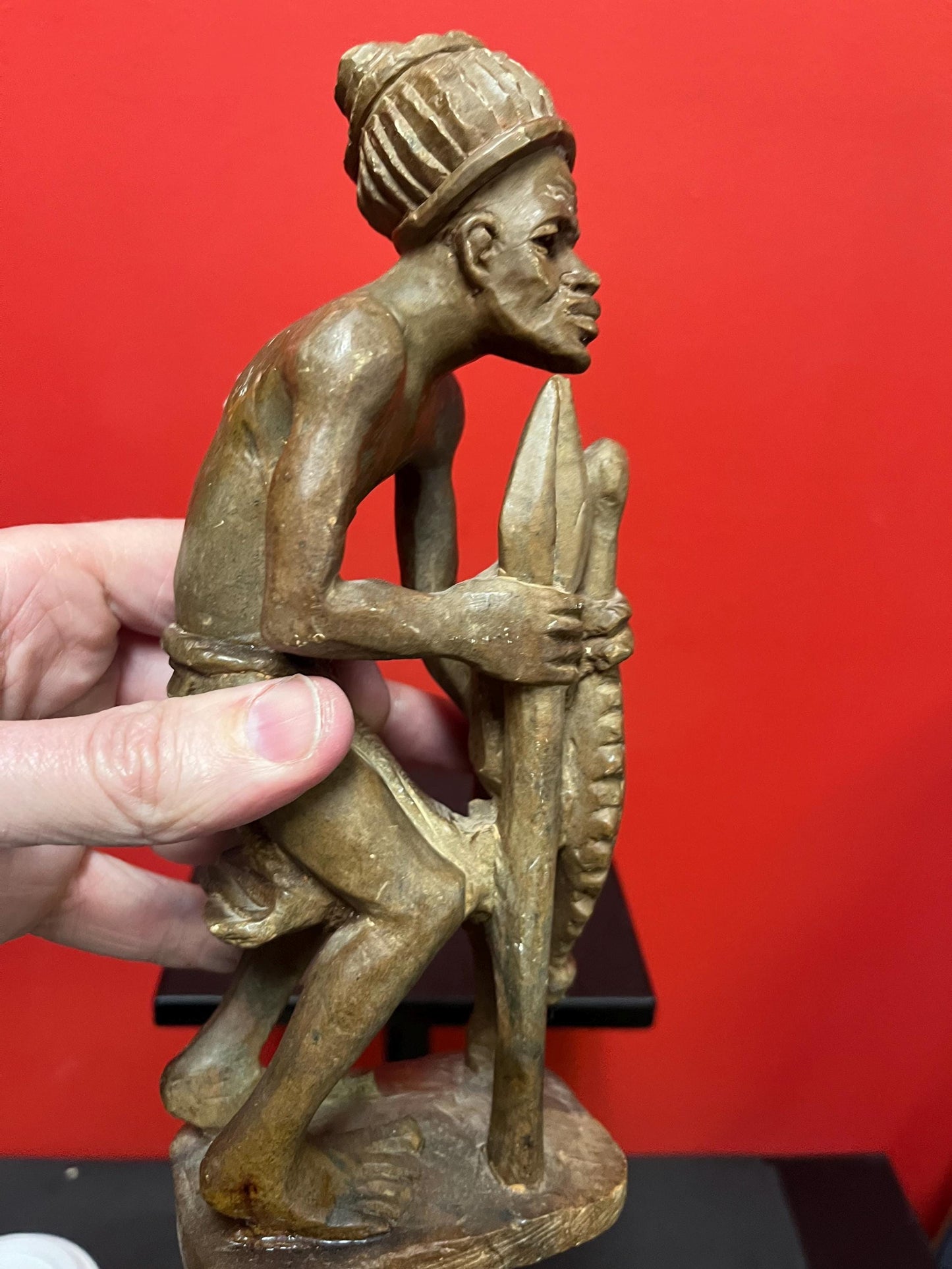 Lovely older 9 inch African stone statue  well carved and heavy