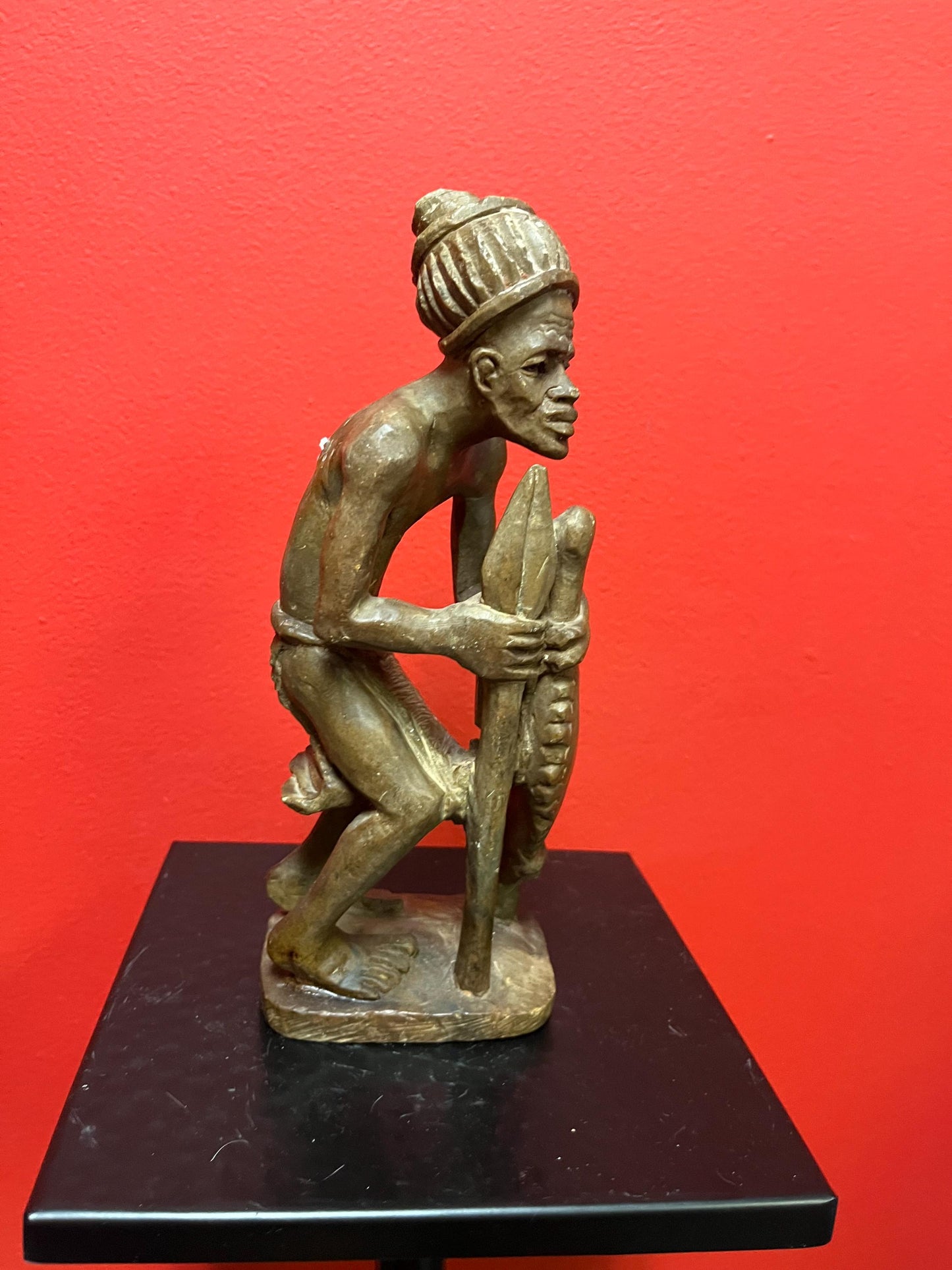 Lovely older 9 inch African stone statue  well carved and heavy