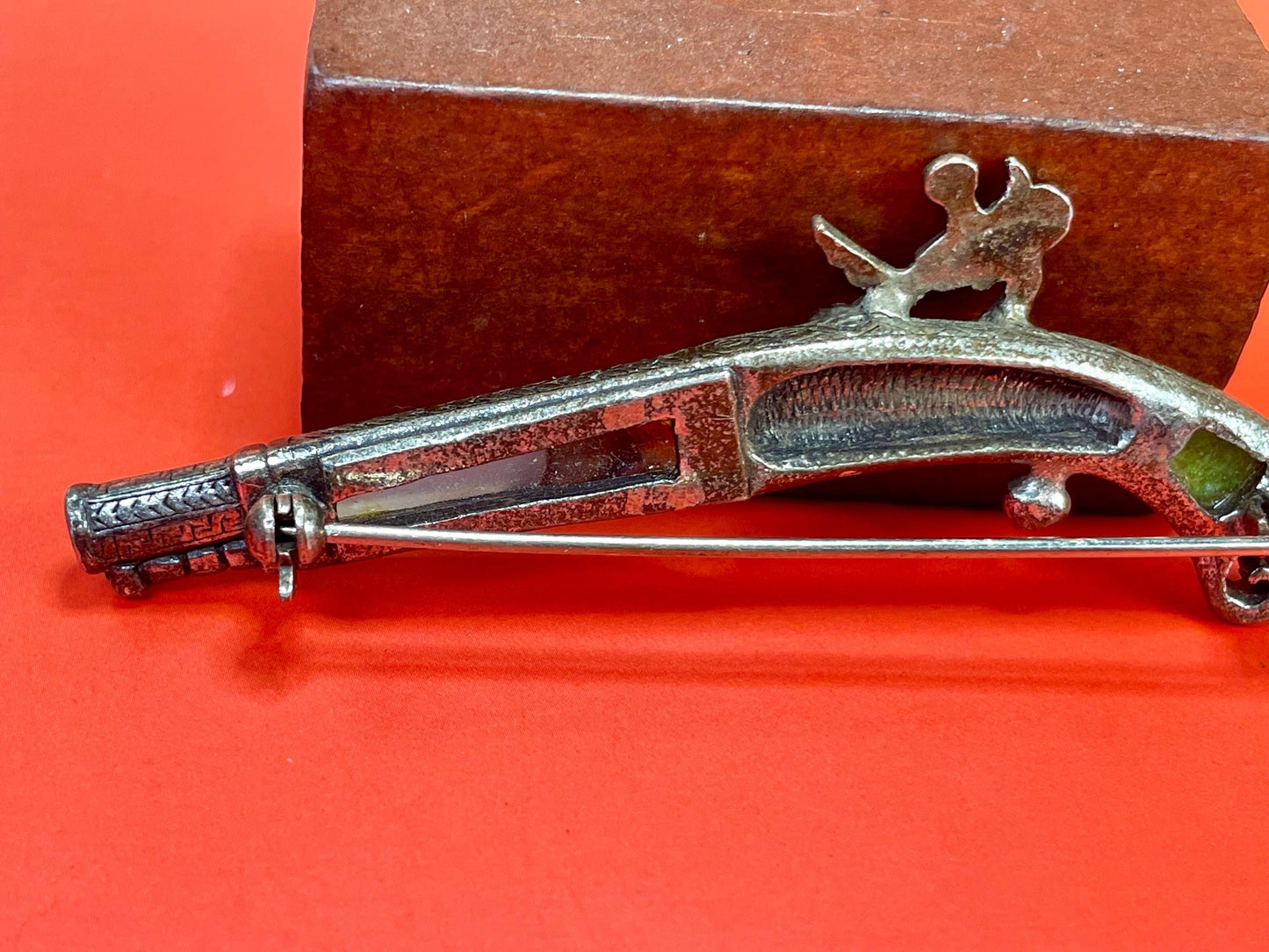 3.25 inch Wide Vintage Gemstone Gun brooch  good condition and great gift