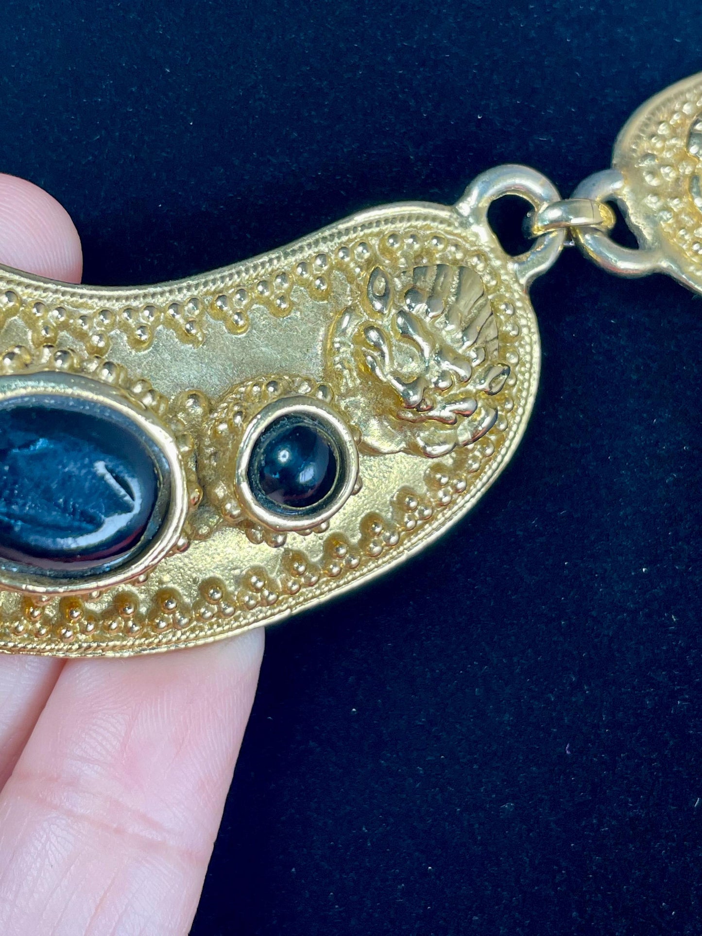 Gold-Tone Collar Necklace with Textured Details & Black Stone Accents