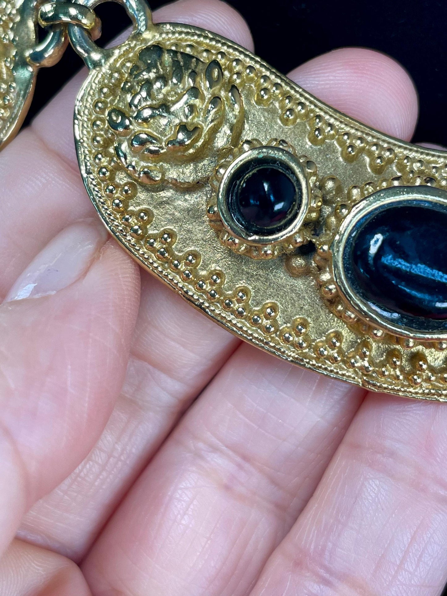 Gold-Tone Collar Necklace with Textured Details & Black Stone Accents