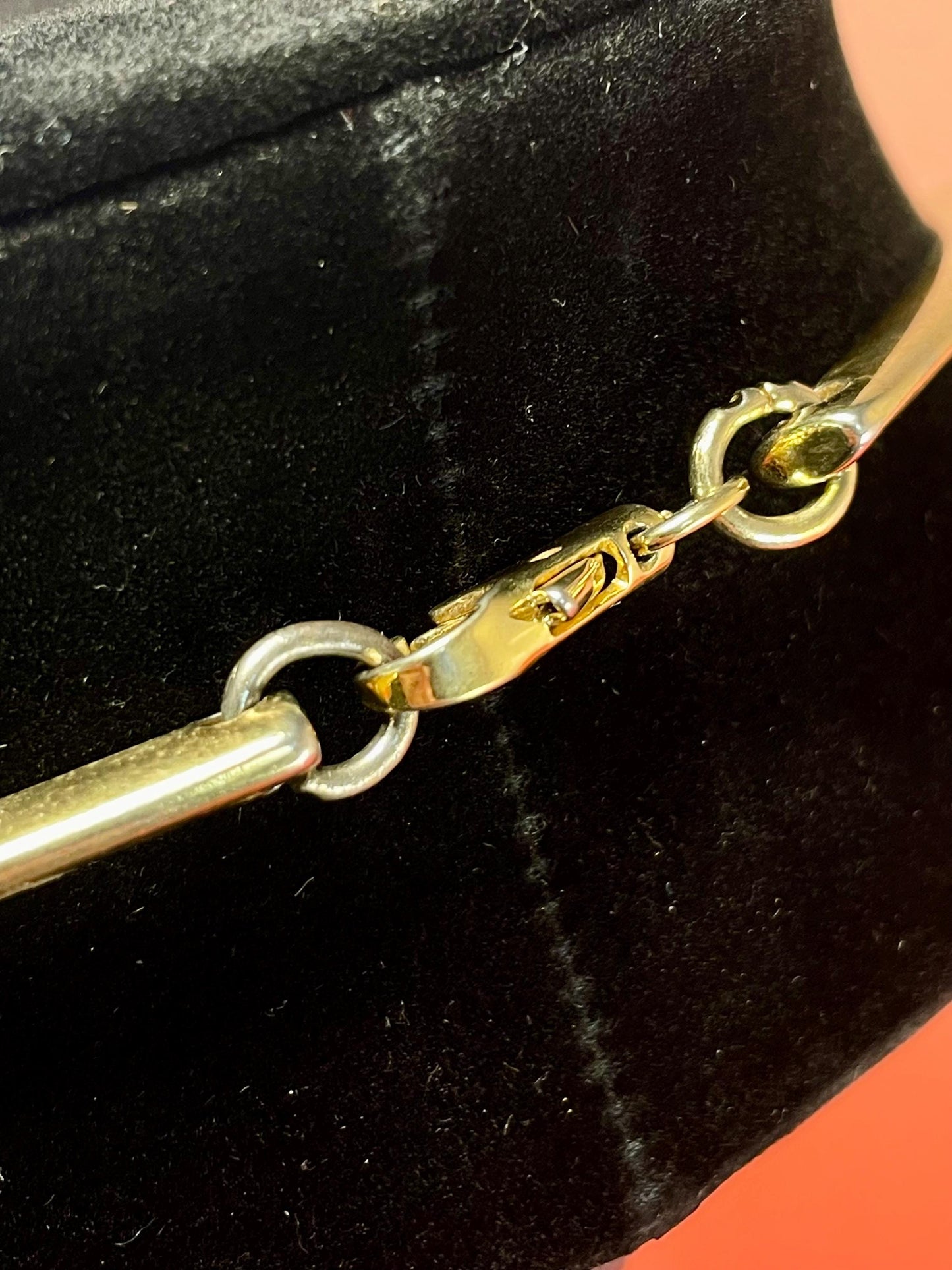 Gold-Tone Collar Necklace with Textured Details & Black Stone Accents