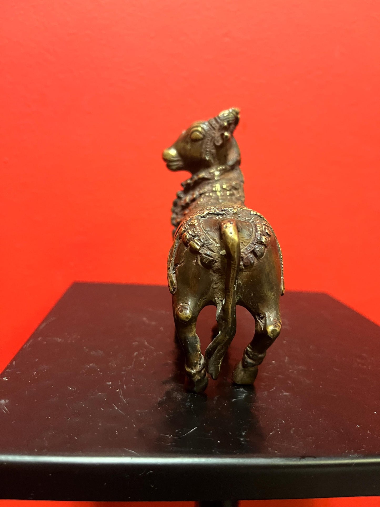 Approximately 18 century Nepalese bronze statue of a bull   Shabdakosh - with amazing patina  and gilding   heavy  4 x 4 inches long- wow