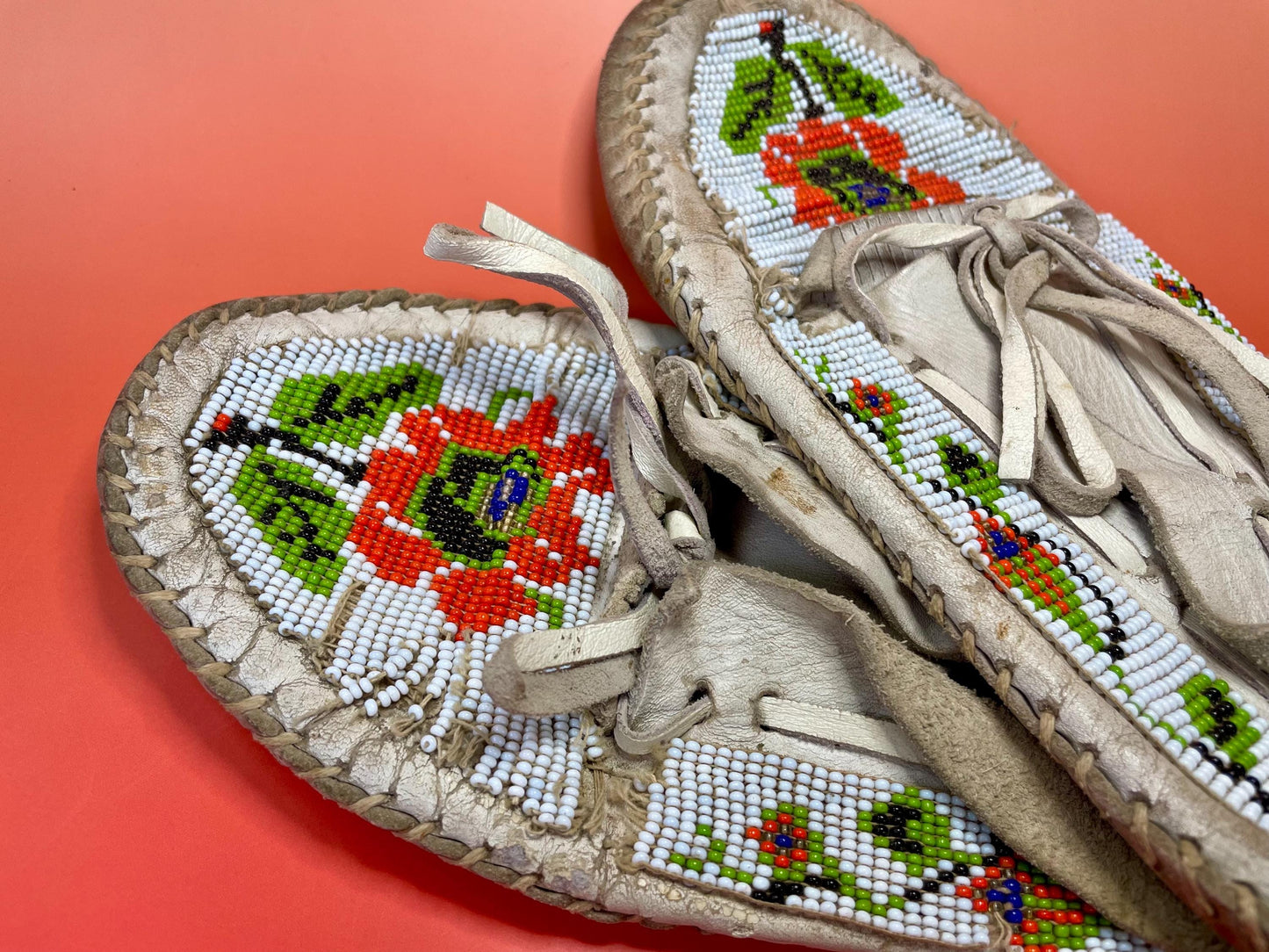 9.75 inch indigenous first nations antique leather and beaded moccasins  lovely design