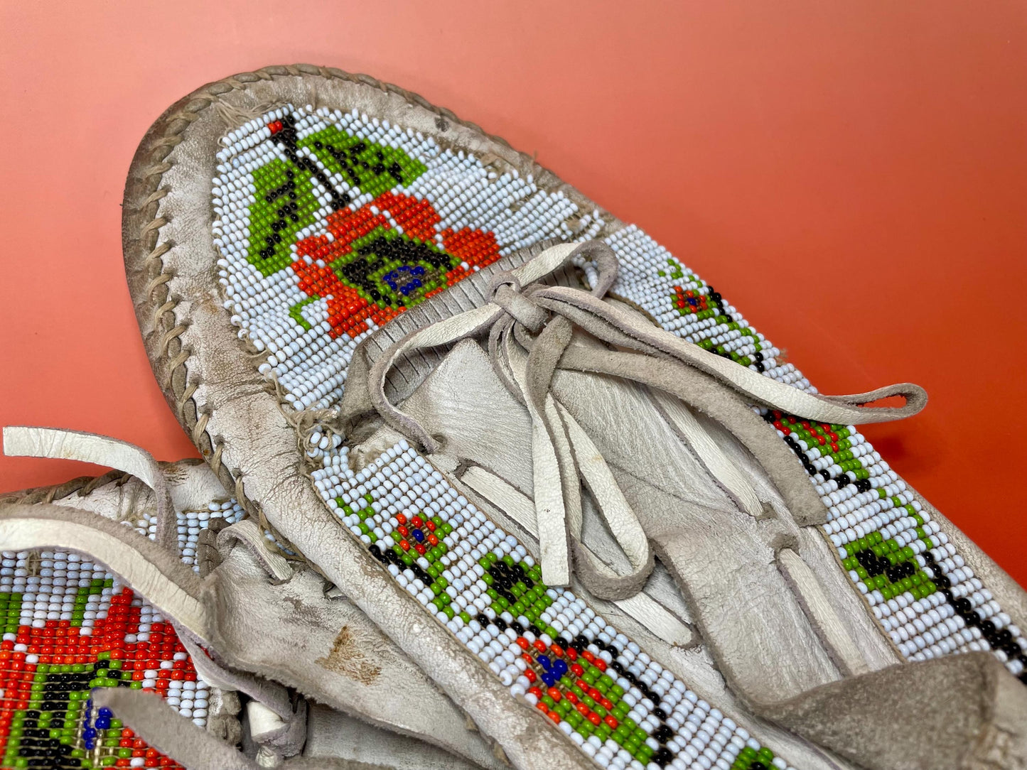 9.75 inch indigenous first nations antique leather and beaded moccasins  lovely design