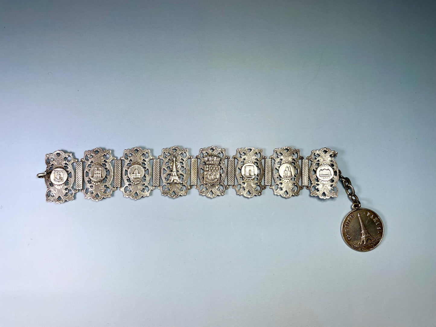 Classic Metal Link Bracelet with Parisian Imagery  Timeless and Versatile