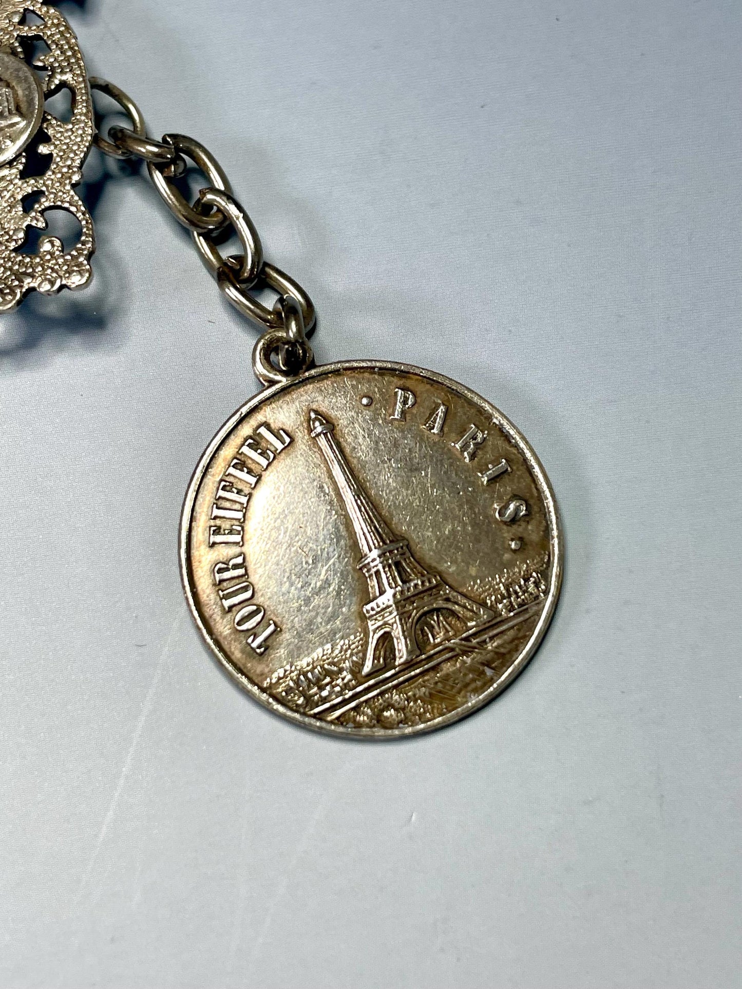 Classic Metal Link Bracelet with Parisian Imagery  Timeless and Versatile