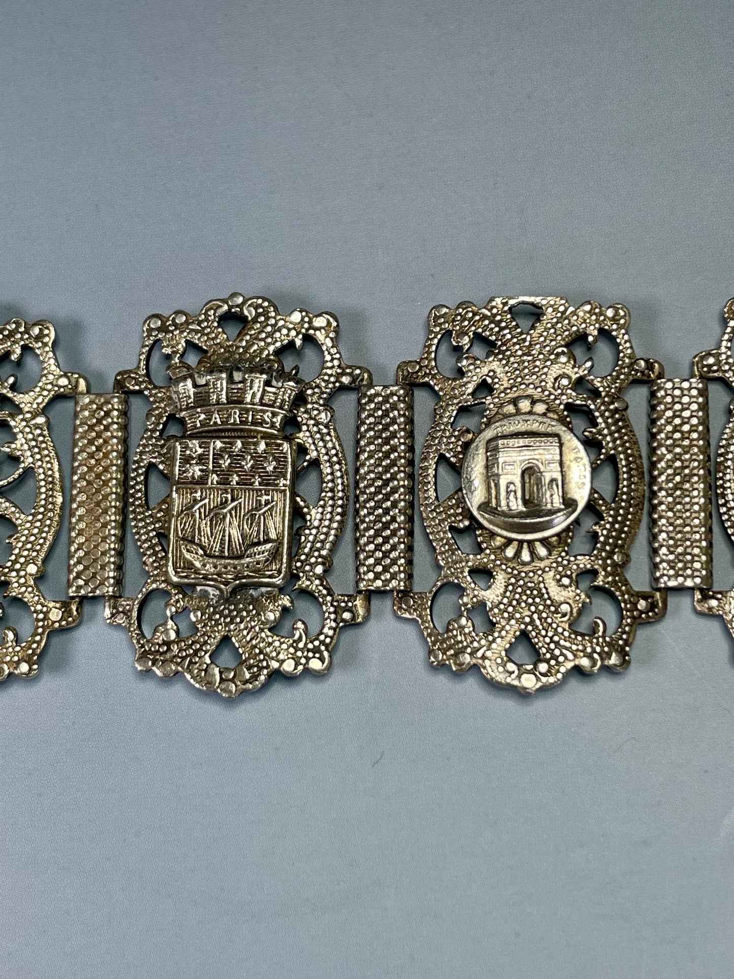 Classic Metal Link Bracelet with Parisian Imagery  Timeless and Versatile