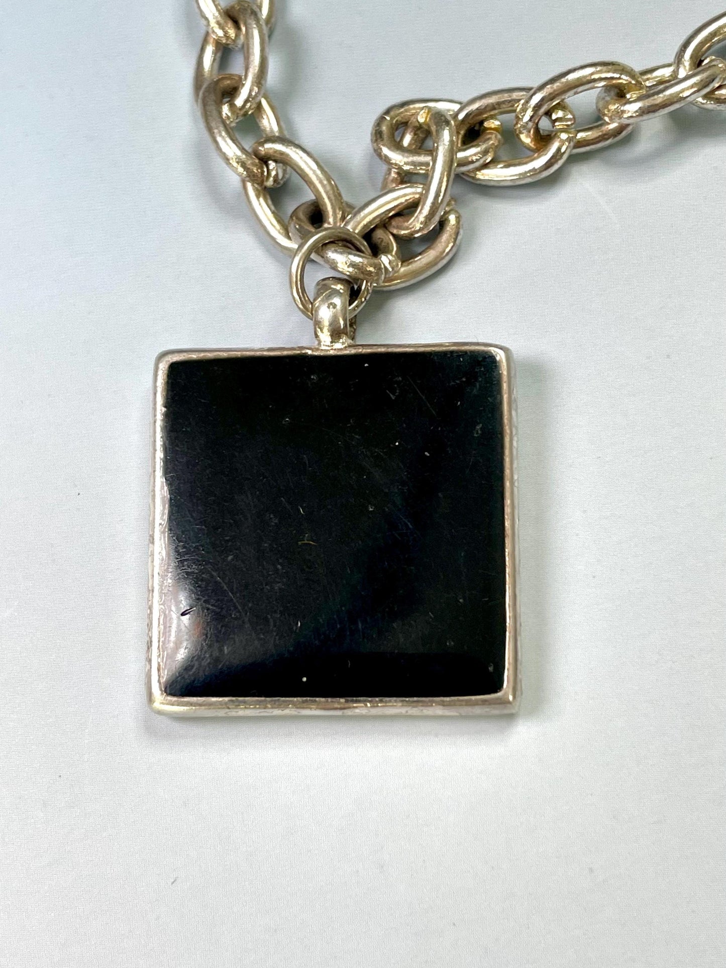 Classic Metal Link Bracelet with Large Black and Green Gem  Timeless and Versatile