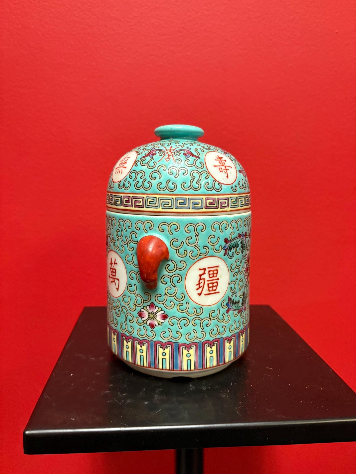 Lovely mid 20 century Chinese vert rose porcelain cannister with lovely handles  7 inches tall and good condition