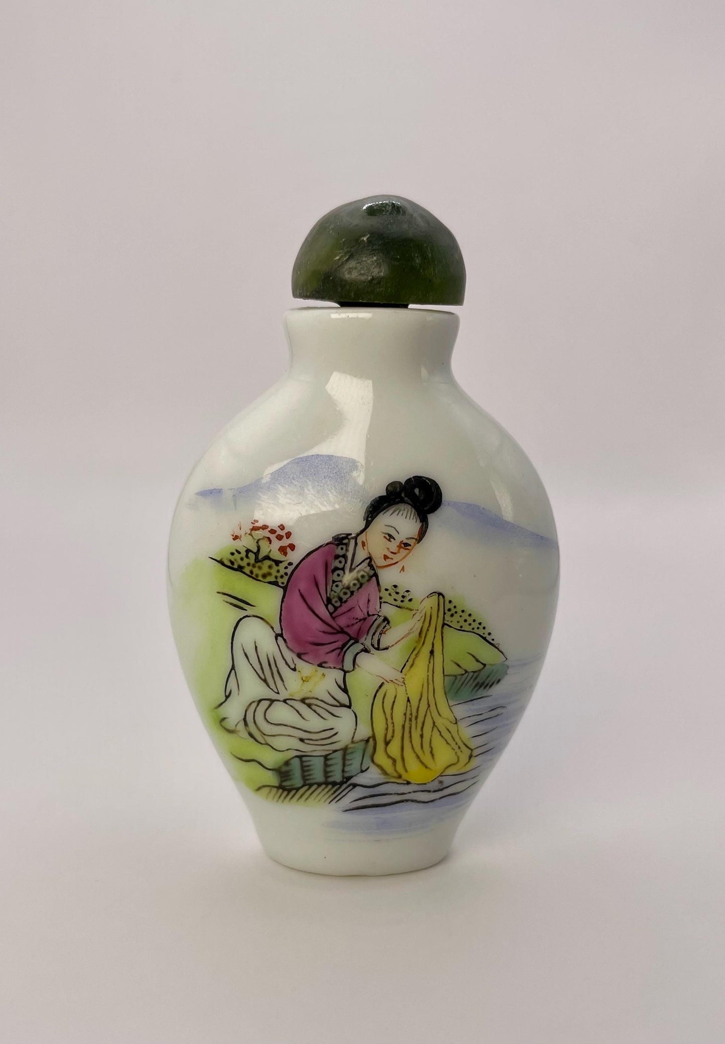 Chinese hand painted porcelain snuff bottle with jade top  Signed