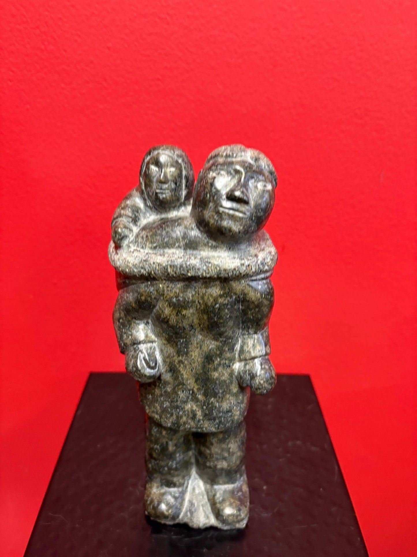 Fabulous signed indigenous Inuit  soapstone statue of a man and child   9 inches tall  great condition and detail  Inuit art